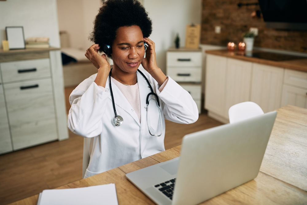 doctor sending an email to patient